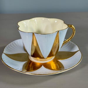 Shelley Harlequin Dainty Shape Cup And Saucer Pale Blue And Gold RARE
