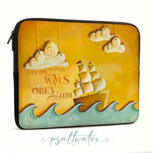 May include: A laptop sleeve featuring a painting of a ship sailing on turquoise waves under a yellow sky. The artwork includes white clouds and the text "EVEN THE WINDS AND WAVES OBEY HIM". The sleeve has a black zipper and trim.