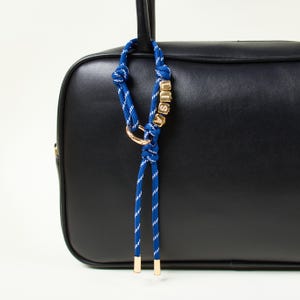 【関税・送料無料】Miu Miu ロープハンドルウォレット 関税・送料無料】Miu Miu ロープハンドルウォレット