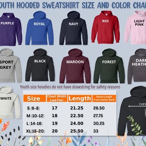 Peut inclure: Un tableau des tailles et des couleurs de sweat-shirts &agrave; capuche pour jeunes. Le tableau affiche diff&eacute;rentes couleurs de sweat-shirts &agrave; capuche : violet, royal, marine, rouge, rose clair, gris sport, noir, bordeaux, for&ecirc;t, gris fonc&eacute; et blanc. Mesures en pouces.
