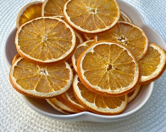 All-natural dried orange slices perfect for crafts, cocktails, potpourri, holiday décor, garnishes, and creative DIY projects.
