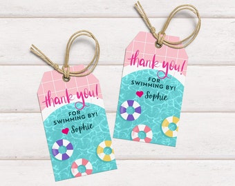 May include: Two pink and blue thank you tags with a pool and inner tubes design. The text on the tags reads "thank you! for swimming by! Sophie".