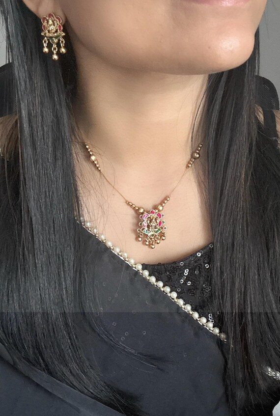 Panoply South Indian Invisible Lakshmi Pendant Necklace | Lightweight Temple Jewelry with Coral Accent & Earrings