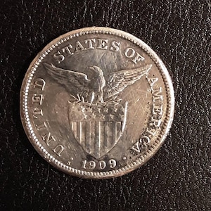 1909S Philippines one Peso coin.  80% silver.  Minted during United States governance.  Item #A12