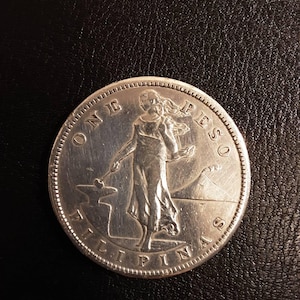 1908年頃のフィリピン1ペソ硬貨。銀含有量80%。商品番号A15