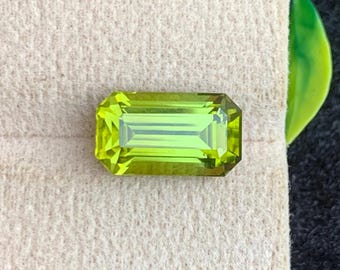 7.30 Carats Loose Greenish Yellow Peridot Gemstone with Emerald Cut, 13.90 x 8.00 x 7.00 MM for Ring