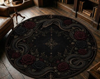 May include: Round black rug featuring a detailed design of a snake coiled around a central pattern with roses. The rug's color palette includes black, burgundy, and gold, creating a gothic or mystical aesthetic. The rug is placed on a wooden floor.