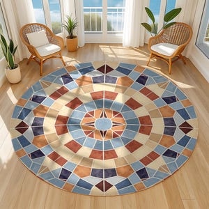 May include: A round area rug with a geometric mosaic pattern. The rug features a central starburst design in shades of blue, brown, and beige. The pattern is composed of various geometric shapes, creating a visually appealing and decorative floor covering.