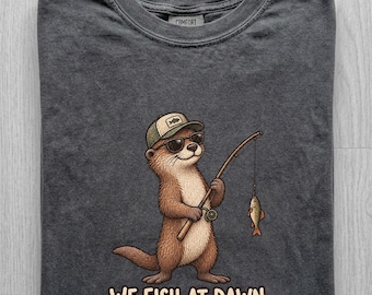 Comfort Colors We Fish At Dawn Shirt, Funny Otter Fishing Tee, Cute Otter T-Shirt, Fisherman Gift, Vintage Outdoor Animal Shirt
