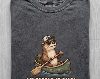 Comfort Colors We Paddle At Dawn Shirt, Funny Otter Canoe Tee, Cute Otter T-Shirt, Canoe Lover Gift, Vintage Outdoor Shirt