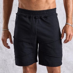 Zwarte biologisch katoenen short: Active Wear voor heren met zakken met ritssluiting
