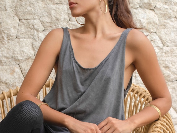 Loose fit tank. Chic sleeveless styles. Midsize bra friendly sleeveles