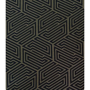 May include: A close-up of a green cotton fleece fabric with a black geometric pattern. The fabric is hand-dyed and printed with a "HYPNOTIK" design.