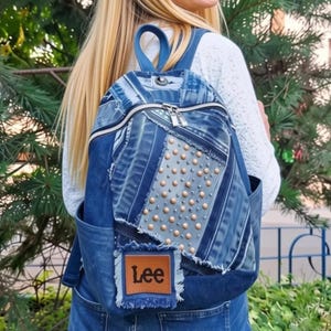 May include: A rustic wooden sign with the text "Welcome to our home" in a handwritten style. The sign is rectangular, with a distressed finish, and features a simple, inviting design. It's suitable for indoor or outdoor use.