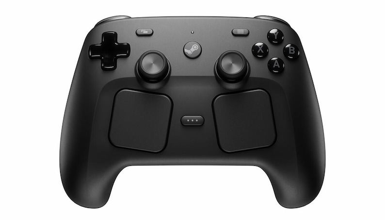 Op de afbeelding: Een matzwarte draadloze gamecontroller met een centrale Steam-logoknop, twee analoge sticks, een richtingspad, vier actieknoppen gelabeld A, B, X en Y, twee grote vierkante touchpads en een kleine menuknop met drie stippen.