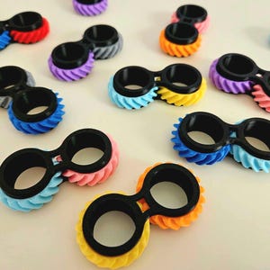 Ruedas Fidget Gear: ¡Alivia el estrés con un giro! Regalo creativo. Divertido y funcional. Retroalimentación táctil. Juguete relajante. Portátil. Alivio del estrés. Concentración.