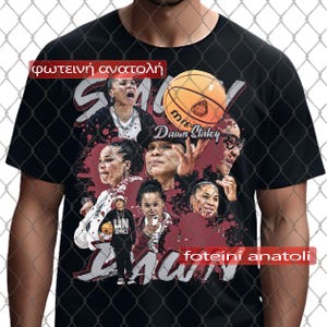 May include: Black t-shirt featuring a collage of images of Dawn Staley, a basketball, and the text "Dawn". The design includes red and white accents, with the Greek text "foteini anatoli".