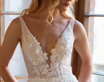 Boho-trouwjurk, 3D-geborduurde trouwjurk, getailleerde bruidsjurk, trouwjurk met diepe V-hals, kanten trouwjurk.