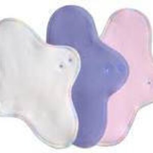 May include: Three reusable cloth menstrual pads in white, purple, and pink.