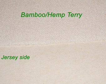 May include: Close-up of a white fabric with a textured looped side labelled "Bamboo/Hemp Terry" and a smooth jersey side labelled "Jersey side".