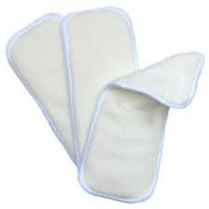 May include: Three white cotton reusable cloth diaper inserts. The inserts are rectangular and have a white trim around the edges.