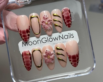 Red French Tip Press-on Nails: Gold Chrome Flower Design