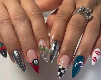 White and Black French Almond Nails with Silver & Martini Olive Art