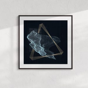 May include: Abstract art print featuring a blue and white geometric shape with a gold grid overlay on a black background.