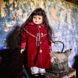 Haunted Porcelain Doll with mysterious Energy