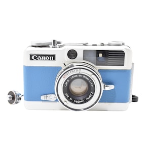 Cámara de película Canon Demi EE17 Half Frame de 35 mm, color azul claro, reacondicionada, con fotómetro en funcionamiento (número de serie 647586).
