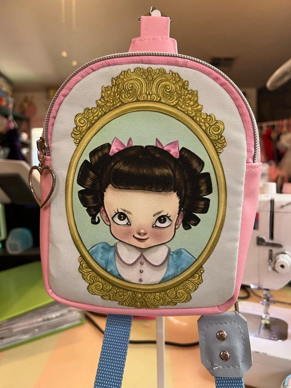 Pink crybaby backpack hotsell