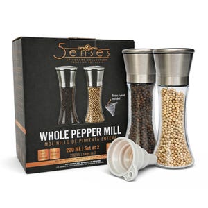 May include: A set of two glass pepper mills with stainless steel tops, one filled with black peppercorns and the other with white peppercorns. A white funnel is included. The box reads "Whole Pepper Mill" and "Spicecare Collection".