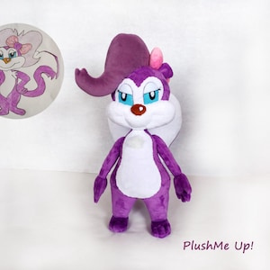 May include: A purple, white, and pink plush skunk toy with a large headpiece. A cartoon drawing of the skunk is in a circle to the left. The text "PlushMe Up!" is in the bottom right. The toy is a soft, cuddly item.
