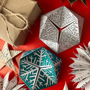 Printable Christmas kaleidocycle template - DIY colour-in snowflake flexagon craft, Secret Santa gift, winter paper toy PDF