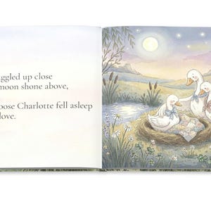 May include: An open book with a watercolor illustration of geese. One goose rests in a nest, while two others stand nearby. The scene is set under a full moon with text that reads, "All snuggled up close as the moon shone above, Silly Goose Charlotte fell asleep safe in love."