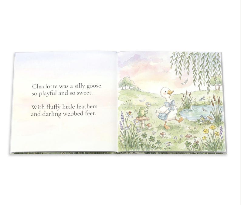 May include: An open book with watercolor illustrations. The left page has text: "Charlotte was a silly goose so playful and so sweet. With fluffy little feathers and darling webbed feet." The right page shows a goose with a blue bag.