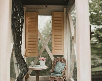 Estructura artesanal con forma de araña/asiento de jardín