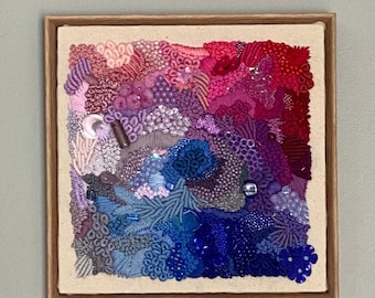 Red, Purple, and Blue, analogous colored embroidery art in a floating frame.