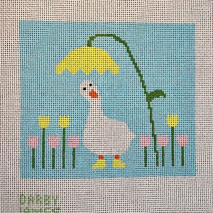 Lienzo bordado a mano de un ganso primaveral con flores y botas de lluvia. La pieza terminada mide aproximadamente 6,5&quot; x 6&quot;.
