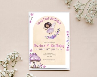 May include: A birthday invitation with a fairy theme. The invitation features a fairy illustration, floral accents, and the text "Fairy First Birthday" and "Phoebe's 1st Birthday". The invitation also includes event details.