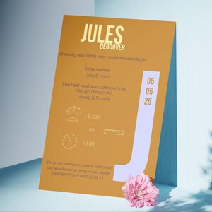 May include: A yellow and white announcement card with the text "JULES DEROOVER" in gold lettering. The card includes the text "Oneindig veel liefde voor ons kleine wondertje" and "Trotse ouders: Joka & Hoen". The card also includes the text "Elke held heeft een sidekick nodig, hier zyn die van mij: Ema & Thomas". The card includes the date "05 05 25" and the time "18.00".