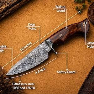 May include: A 10-inch knife with a Damascus steel blade made of 1080 and 15N20 steel, featuring a 4.9-inch edge, a drop point, and a double edge. The handle is crafted from walnut wood and includes a safety guard and a lanyard hole at the end.