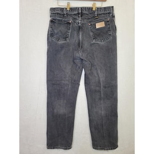 Jeans Wrangler vintage anni '80, stile western bikercore, denim nero slavato, taglia 36 (35x31). immagine 1