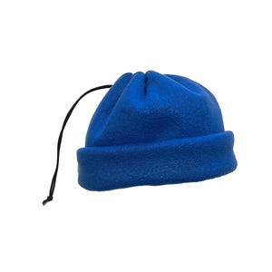 May include: A blue fleece beanie with a drawstring.