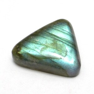 May include: A triangular, iridescent green labradorite gemstone with a smooth, polished surface.