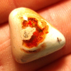 8.52 carats Vintage Mexican Fire Opal in Matrix Cabochon with Green and Red Pinfire Rich Orange - Modified Trillion - Perfect for a Beginner