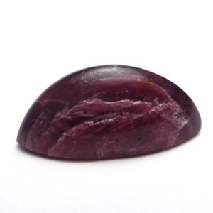 May include: A cabochon cut, purple gemstone with a smooth, polished surface. The stone has a striated pattern and a slightly oval shape.