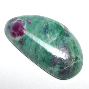May include: A green and pink cabochon gemstone with a smooth, polished surface. The stone has a mottled pattern of green and pink.