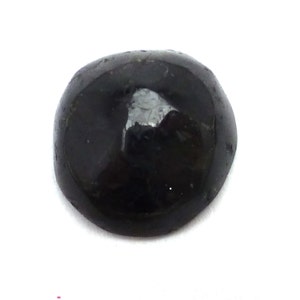 May include: A smooth, round, black gemstone with a high gloss finish.