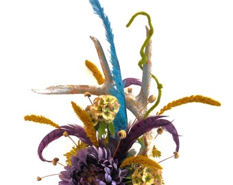 Antler Centerpiece Accent, genuine deer antler in metal leaf, purple mum, green accent flowers, teal ostrich, purple and teal pheasant, moss